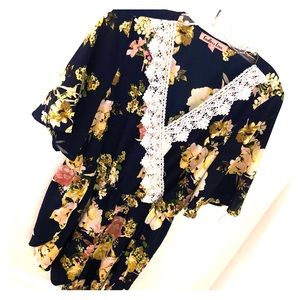 Floral shorts romper (size L). Worn once.